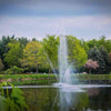 Image of Scott 1-1/2HP Pond Fountain Clover Pattern by Scott Aerator Operating in a Pond with Trees at the Back 13002