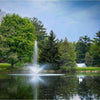 Image of Scott 1-1/2HP Pond Fountain Skyward Pattern by Scott Aerator Operating in a Pond with Trees at the Back 13007