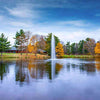 Image of Scott 3HP Fountain with Gusher Pattern Operating in a Pond with Trees at the Back 13210