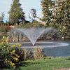 Image of Kasco 3/4HP Aerating Fountain 3400VFX with V-Shape Pattern Operating in a Pond Surrounded by Plants