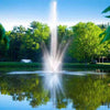 Image of Scott 1-1/2HP Pond Fountain with Atriarch Pattern Operating in a Pond with Trees at the Back 13015