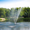Image of Scott 1-1/2HP Pond Fountain with Belcrest Pattern Operating in a Pond with Trees at the Back 13014