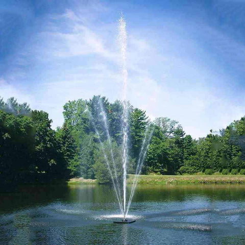Scott 1-1/2HP Pond Fountain Clover Pattern by Scott Aerator Operating in a Pond with Trees at the Back 13002