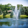 Image of Scott 1-1/2HP Pond Fountain Clover Pattern by Scott Aerator Operating in a Pond with Trees at the Back 13002