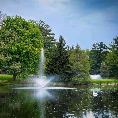 Scott 1-1/2HP Pond Fountain Skyward Pattern by Scott Aerator Operating in a Pond with Trees at the Back 13007