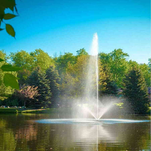 Scott 1-1/2HP Pond Fountain Skyward Pattern by Scott Aerator Operating in a Pond with Trees at the Back 13007