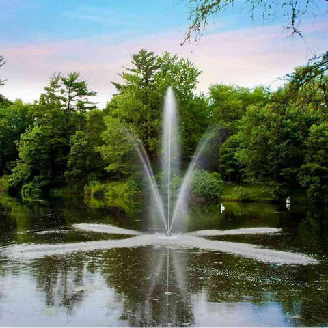 Scott 1/2HP Pond Fountain Clover Pattern by Scott Aerator Operating in a Pond with Trees at the Back 13000