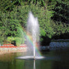 Image of Scott 1/2HP Pond Fountain Gusher Pattern by Scott Aerator Operating in a Pond with Trees at the Back 13513