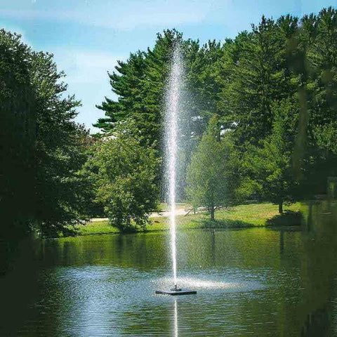 Scott 1/2HP Pond Fountain Gusher Pattern by Scott Aerator Operating in a Pond with Trees at the Back 13513