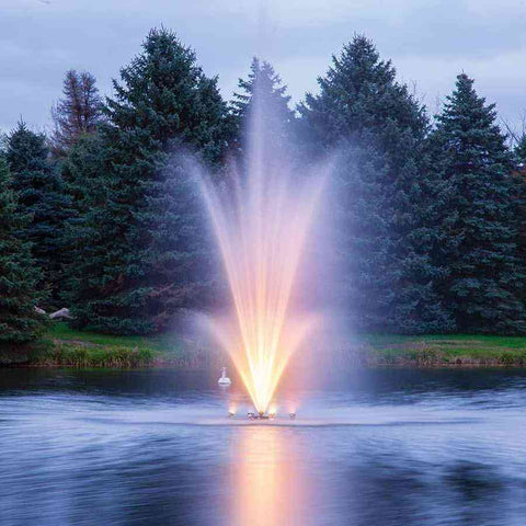 Scott 1HP Fountain with Amerst Pattern Operating in a Pond with Orange lights 13240