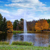 Image of Scott 3HP Fountain with Gusher Pattern Operating in a Pond  with Trees at the Back 13210