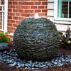 Image of Aquascape Medium Stacked Slate Sphere Operating Beside a House 78288