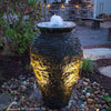 Image of Aquascape Medium Stacked Urn Fountain Kit Operating in the Yard with Lights 58090