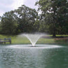 Image of Kasco 1HP Aerating Fountain 4400VFX with V-Shape Pattern Operating in a Pond with Trees at the back 115V/230V