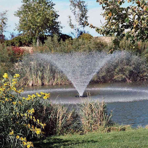 Kasco 1HP Aerating Fountain 4400VFX with V-Shape Pattern Operating in a Pond Surrounded by Plants  115V/230V