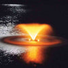 Image of Kasco 1/2HP Aerating Fountain 2400VFX  Operating in a Pond at night with Orange Lights