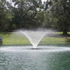 Image of Kasco 1/2HP Aerating Fountain 2400VFX  Operating in a Pond Surrounded by Trees