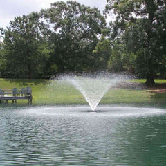 Kasco 2HP Aerating Fountain 8400VFX 2.3VFX with V-Shape Nozzle Operating in a Pond with Trees