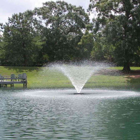 Kasco 2HP Aerating Fountain 8400VFX 2.3VFX with V-Shape Nozzle Operating in a Pond with Trees