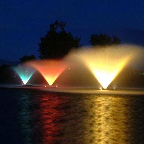 Kasco 5HP Aerating Fountains 5.1VFX Operating in a Pond at Night with Different Colored Lights
