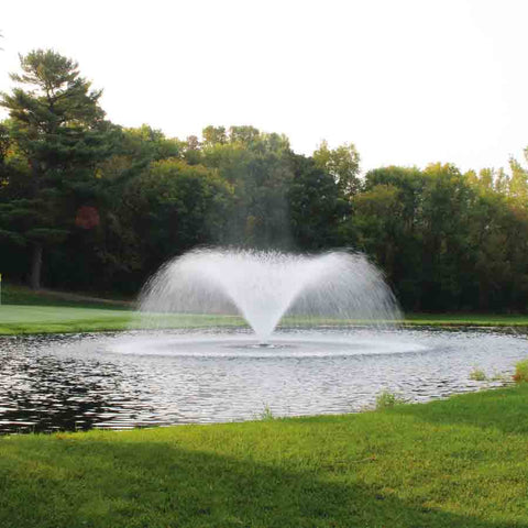 Kasco 3-Phase 5HP Aerating Fountain 5.3VFX 230V Operating in a Pond with Trees at the Back
