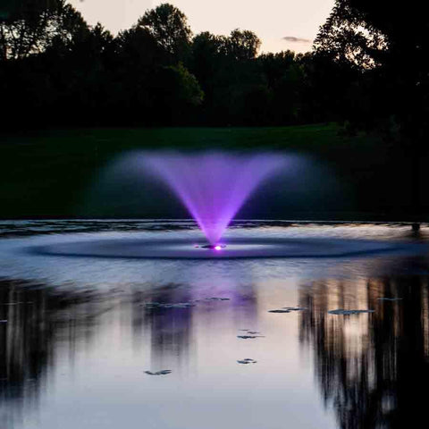 Kasco 3-Phase 5HP Aerating Fountain 5.3VFX 230V Operating in a Pond at Night with Purple Lights