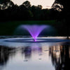 Image of Kasco 3-Phase 5HP Aerating Fountain 5.3VFX 230V Operating in a Pond at Night with Purple Lights
