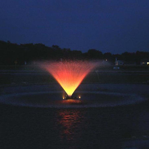 Kasco 3-Phase 5HP Aerating Fountain 5.3VFX 230V Operating in a Pond at Night with Orange Lights