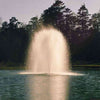 Image of Kasco 5HP Decorative Fountain 5.1JF 5.3JF 230V with Birch Pattern Operating in a Pond with Trees at the Back