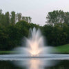 Image of Kasco 5HP Decorative Fountain 5.1JF 5.3JF 230V Operating in a Pond with Warm White Lights