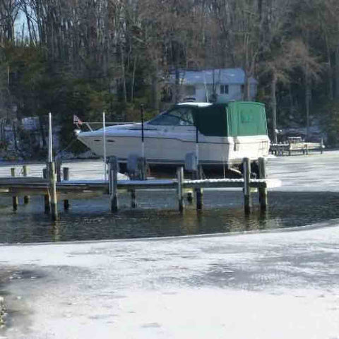 Kasco De-Icer Attached to a Dock with Icy Water.