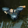 Image of Oase Swimskim Skimmer for Pond Cleaning 50040 Operating in a Pond